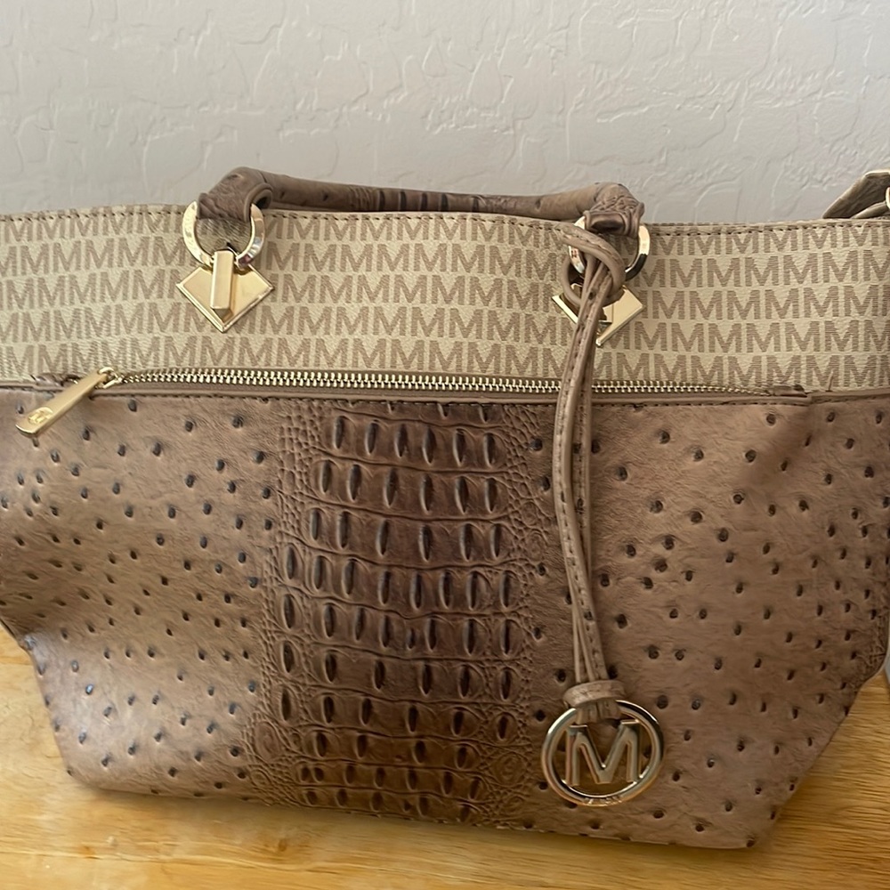 Lovely purse, tan/beige/brown with gold accents.